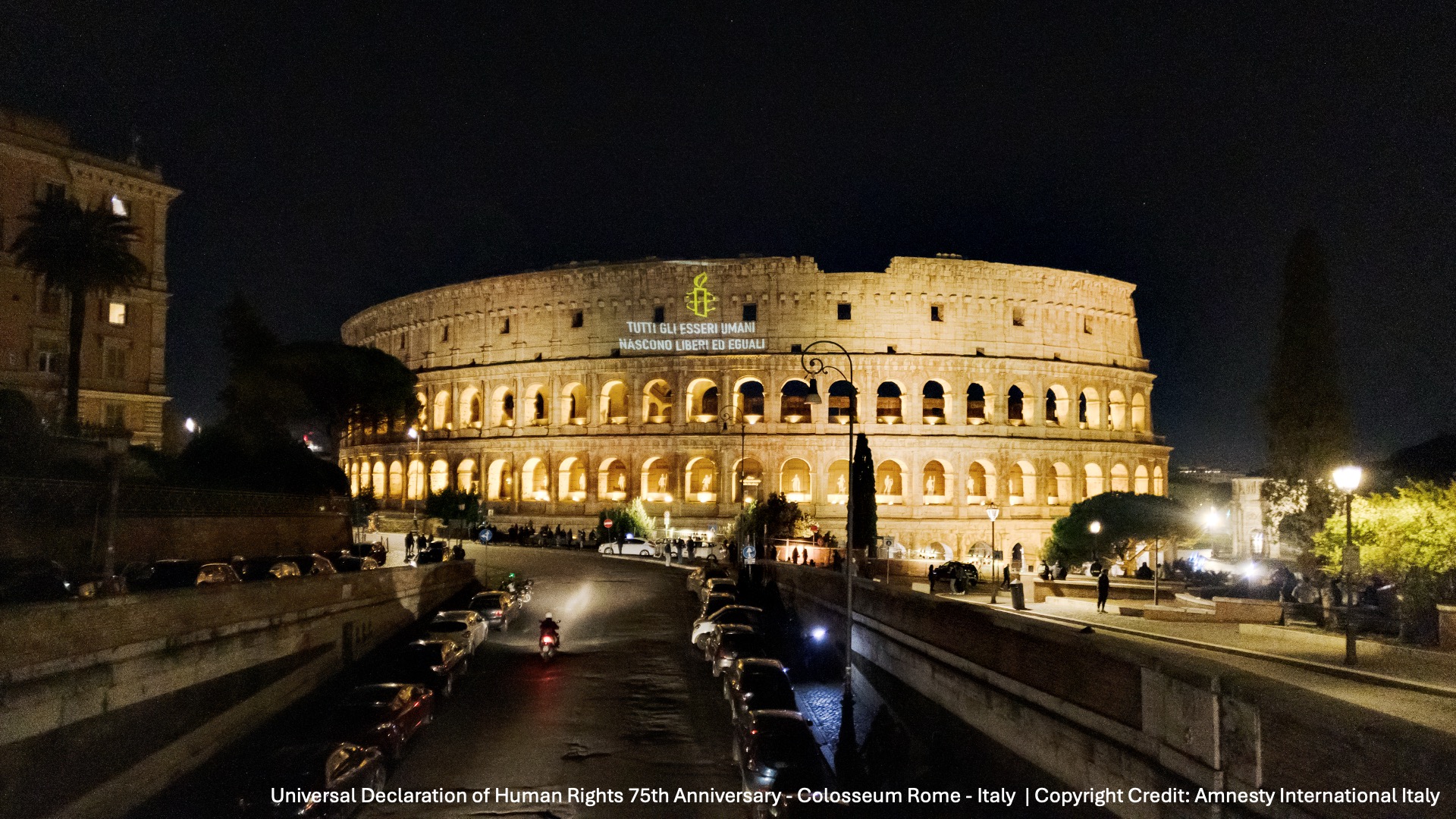 "Universal Declaration of Human Rights 75th Anniversary", Colosseum Rome (Italy) In celebration of the 75th anniversary of the Universal Declaration of Human Rights, the Amnesty candle and the opening lines of Article One were we projected on the most famous monument in Rome. Copyright Credit: Amnesty International Italy.
